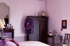 05 a lilac and purple bedroom with color block walls, vintage furniture, monochromatic purple bedding and metallic touches