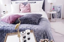 18 a gorgeous glam bedroom with a purple bed, a pillow and a blanket, touches of gold for a more chic feel