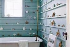a lovely bathroom with lots of things displayed on ledges