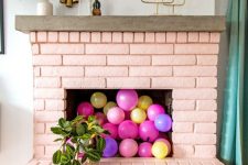21 a blush brick fireplace with colorful balloons inside will make a cute girlish accent in your living room