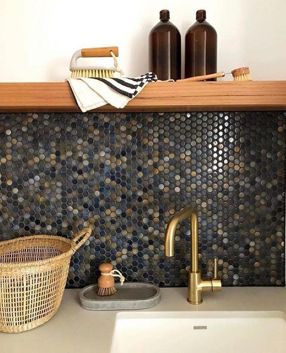 a bold dark blue, gold and grey penny tile backsplash will bring much color and texture to any kitchen