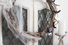 diy halloween wreath with spiderwebs