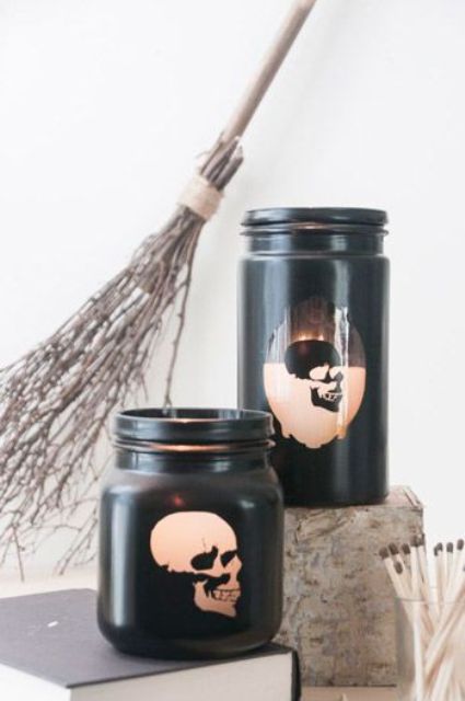 jars painted black with skull stencils on them are a nice Halloween like idea to rock and will fit a modern party