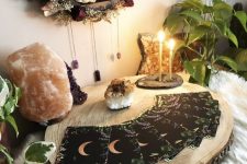 23 magical boho Halloween decor with tarot cards, crystals and geodes, candles and a lunar shelf with dried blooms