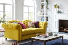 a neutral living room with a colorful accent