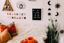 decorate your bedorom with cool accessories – candles, printed pillows, signs and wall art pieces