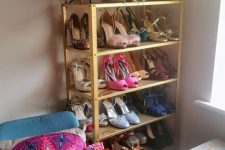 08 an IKEA Hyllis shelf fully spray painted gold makes up a chic shoe storage unit