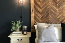 08 an oversized dark stained herringbone framed wooden headboard is a cozy rustic idea for your bedroom