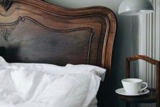 24 an elegant rich stained carved wooden headboard with chic decor brings a touch of color and elegance to the space