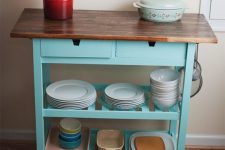 a bright IKEA Forhoja kitchen cart hack with turquoise paint and a butcherblock countertop for your kitchen