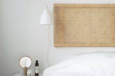 a cool rattan headboard made of a frame of an Ivar side unit and cane webbing is a very fresh ide for a bedroom