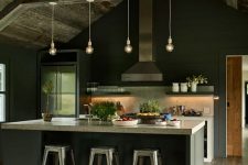 an industrial kitchen design with lots of metal