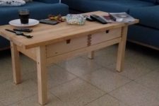 a simple low coffee table of an IKEA Forhoja cart is a cool and natural idea and you can craft it easily and fast