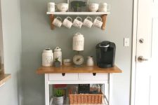 a stylish IKEA Forhoja hack with white paint and a butcherblock countertop to make it a coffee station