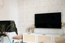 an IKEA Besta TV unit hacked with new handles and cane webbing is very stylish and a bit boho