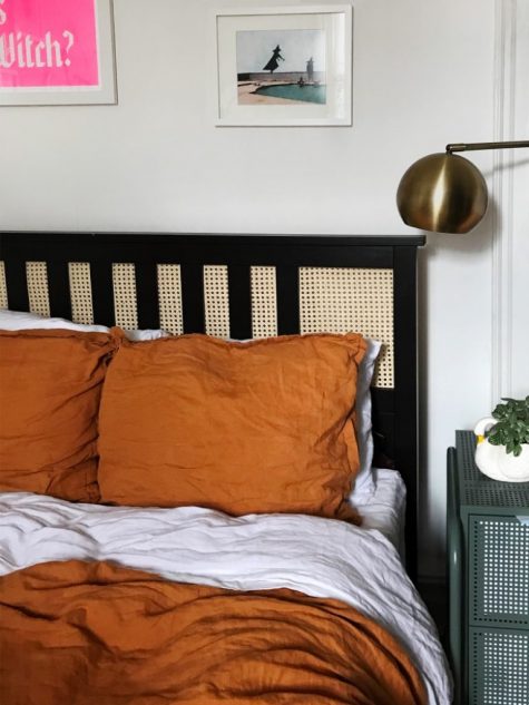 an IKEA Hemnes bed hacked with cane webbing looks super chic and bold and adds contrast to the space