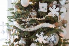 02 super chic Christmas tree decor with woven and bead garlands, snowflakes and houses, feathers and twine and knit ornaments
