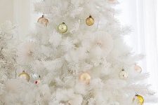 10 a pure white Christmas tree decorated with beads and gold Christmas ornaments is a very beautiful and stylish idea for holidays