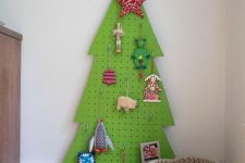 13 a bright green pegboard Christmas tree is a lovely idea for a kid’s room, and your kid may hang toys on that