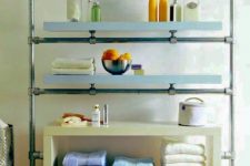 14 IKEA Lack shelves and galvanized pipe and fittings turned into a stylish and chic shelving unit