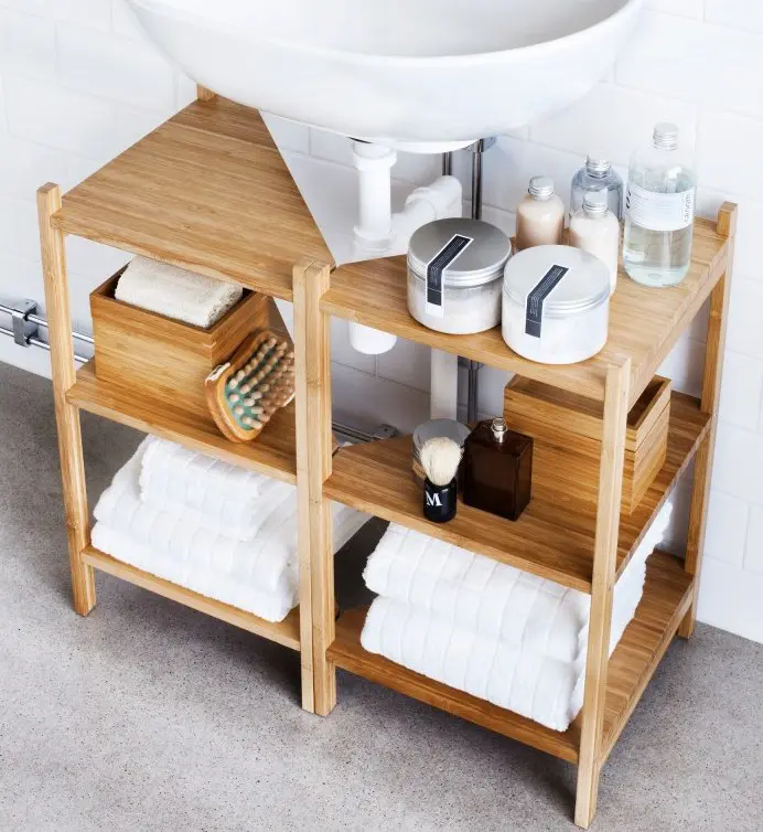 two Ragrund shelves by IKEA compose one lightweight sink unit that doesn't look bulky and gives storage space