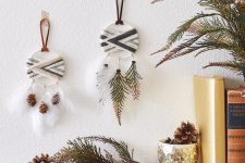 20 boho tribal Christmas ornaments shaped as dream catchers with feathers, pinecones and fir branches are lovely
