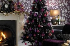 22 a black Christmas tree with purple, pink and fuchsia ornaments, lights and bows is a bold and chic idea