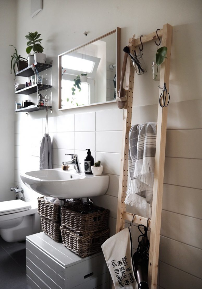 an Ivar side unit can be used as a ladder for a sleek storage unit in your bathroom, it's modern and fresh