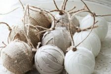 Christmas ball ornaments wrapped in burlap and with twine are a cute idea for a rustic tree