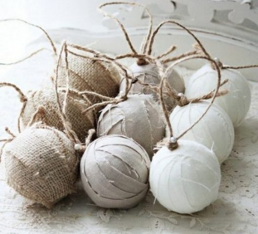 Christmas ball ornaments wrapped in burlap and with twine are a cute idea for a rustic tree