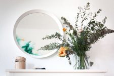 a usual IKEA mirror hack with watered down glass paint to give it a fresh and edgy feel