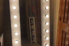 add lights along the frame to an IKEA mirror for comfortable makeup and dressing up in front of it