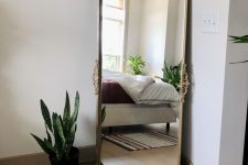 an IKEA Nissedal mirror transformed into a beautiful vintage-looking masterpiece that will bring a refined feel anywhere
