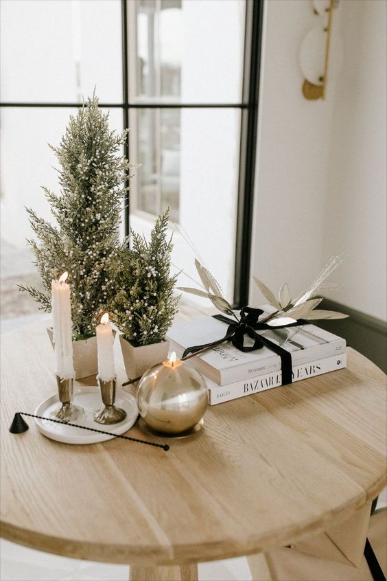 small tabletop Christmas trees with some snow on them are perfect for a modern or Scandinavian space