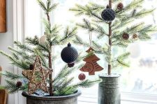tabletop Christmas trees with pinecones, black and white ornaments and som paper ones are great
