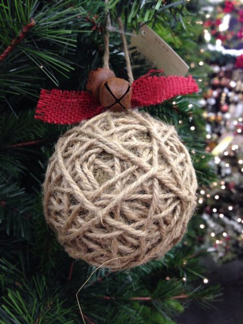 twine wrapped Christmas ornament with red burlap and rust bells is a great rustic decoration that you can make