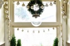 a cute way to decorate a window for Christmas