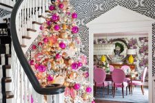 a bright and fun glam Christmas tree – a flocked one decorated with gold, pink, blush ornaments and lights plus hot pink gift boxes