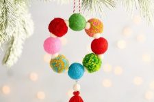 a colorful pompom and bead Christmas ornament with a tassel is a creative idea for the holidays
