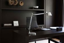 a moody minimalist home office