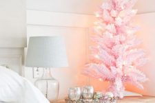 a cute pink christmas tabletop tree