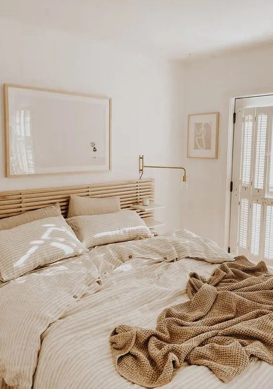 all neutrals make the bedroom look bigger and more inviting thanks to the soft and warm shades