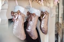 rose gold foliage, copper and pink ornaments, rose gold sequin stockings and candles for chic and glam Christmas decor