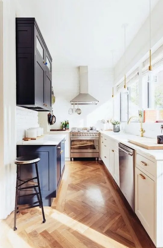 a cute kitchen with shaker style cabinets