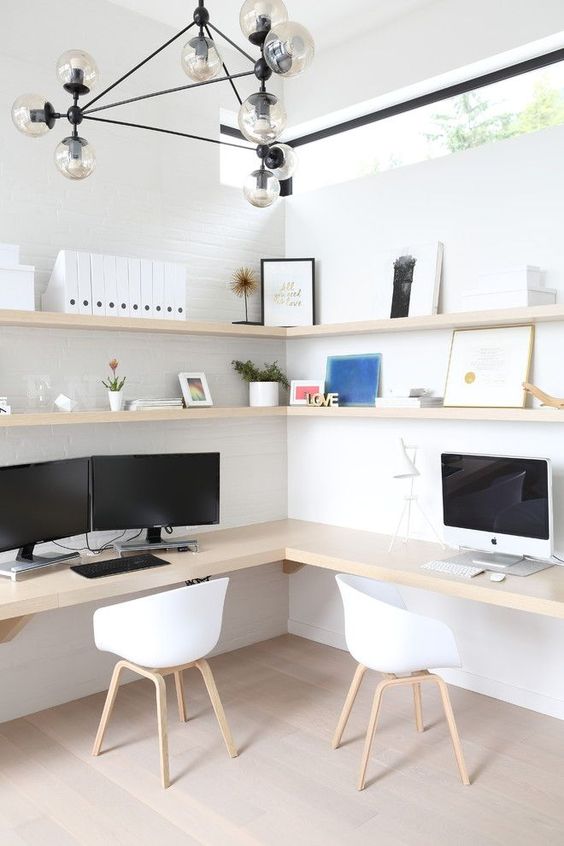 a contemporary shared home office with floating desks