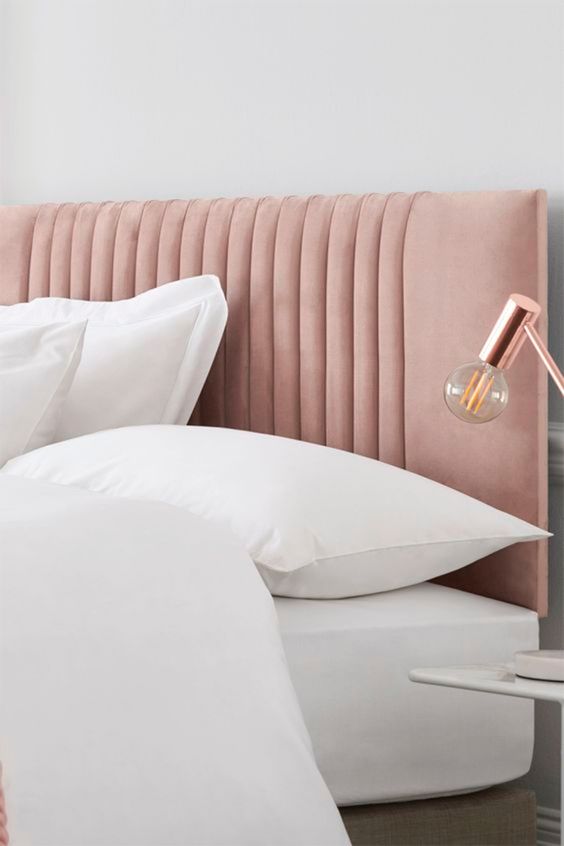a pink headboard inspired by channel tufting is a stylish modern take on art deco pieces