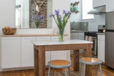 a stylish kitchen with shaker style cabinets
