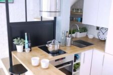 a modern farmhouse kitchen with sleek cabinets, butcherblock countertops, a breakfast bar with tall black stools
