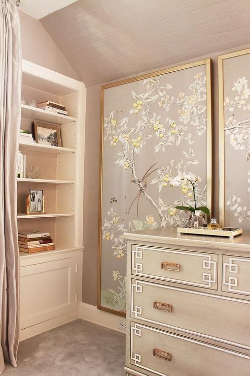 30 a neutral and refined space with chinoiserie themed artworks made of wallpaper that add chic to the nook