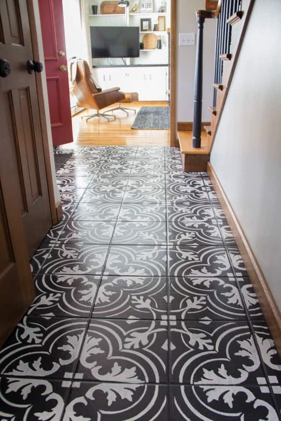 a chic entryway with a lovely black and white mosaic tile floor is a great idea to rock for a modern space